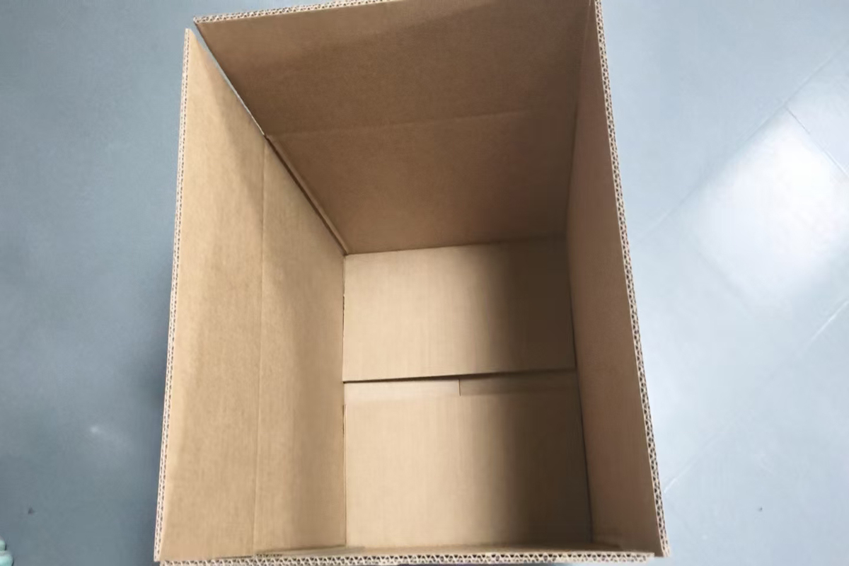 Multi-layer corrugated board providing strength for shipping boxes